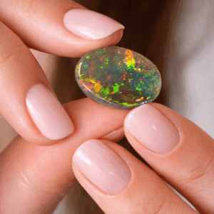7.6 ct - Natural Black Opal Oval Rainbow Floral Mosaic Pattern
